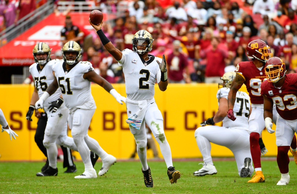 New Orleans Saints quarterback Jameis Winston (2) attempts a pass against Washington. Mandatory Credit: Brad Mills-USA TODAY 